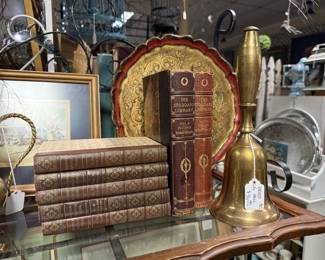 The Stoddard Library vintage books, large brass bell, silver plate serving trays