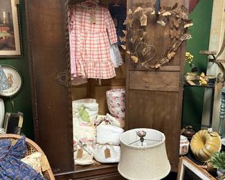 children's clothing, lamp, bundt pan, vintage armoire, framed art