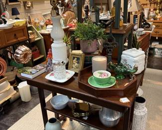 side tables, vintage lamp, copper bundt pan, framed art