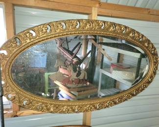 Oval gilt framed mirror