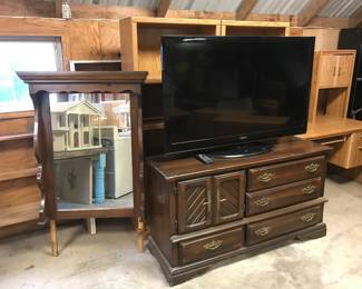 Dresser and mirror. Large flat screen TV