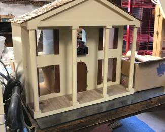 Doll house and heavy rustic glass top table