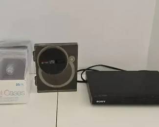 Sony CDDVD Player Model  DVPSR210P, Empty CD Cases  CD Cleaner