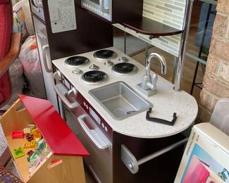 Children’s toy kitchen and dolls and dreams doll house 