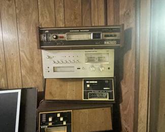 large selection of old receivers, tuners, records and radios