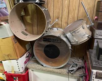 Drums and lots of framed art, more magazines