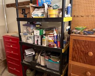 Black and Yellow 4-Tier Heavy Duty Plastic Shelving Unit with Assorted Contents