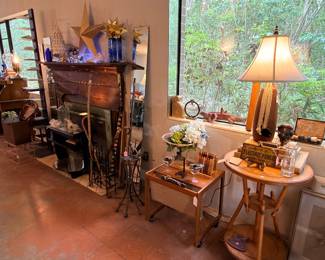 Don’t you just love these beautiful picture windows! I digress… Still some good items left in the main room here. One of my favorite pieces of furniture is the small Danish side table/magazine holder on wheels…