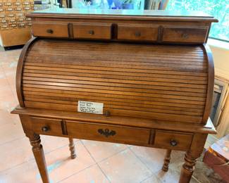  This is such a perfect little piece! A small vintage roll top desk with all the cute little nooks and crannies for the writer…