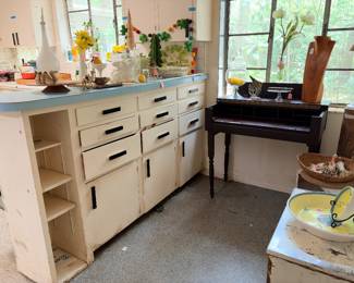 Another favorite piece of mine is this small writer’s desk that’s in the kitchen nook area. Just the perfect little size for a tiny room…