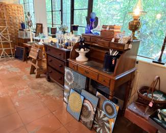 We still have a couple of really cute small pieces of furniture left. And of course, lovely pieces of kaleidoscope postcard art by the artist who lived here. They’re so fun!