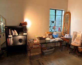 I’m surprised that mirror with the cat tails is still in the collection. As well, that antique rolling office chair…