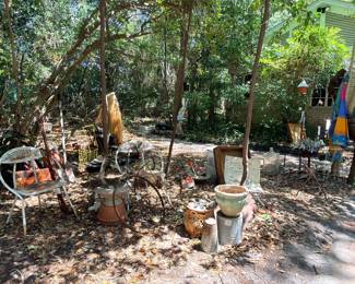 I’m surprised no one has bought those cute little white metal chairs. A good cleaning with a new paint job and some rubber feet. Add colorful pillows and there you have.