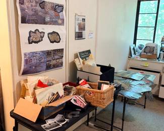 If you go into this studio room, check out that poster on the wall. It shows the Florida Picture Show exhibit with the completely wallpapered exhibit. room using postcard panels...