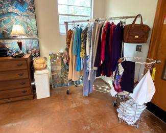 The clothing sale went great this weekend, but we still have some really nice pieces on a couple of racks in the ladies room.…And handbags