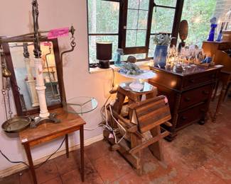 The one thing in this picture that has gone is the custom-made stand for an art piece. It’s the one in the middle with the giant stone there. It went bye-bye today…