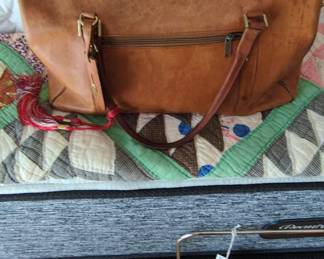 Vintage Leather Weekender Bag with Tassel Accent