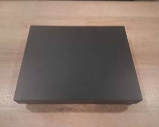 Unidentified Dark Gray Electronic Device