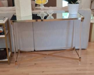 Modern Mirrored Console Table with Gold Accents and Acrylic Legs
