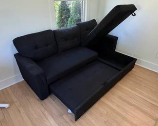 Black Upholstered Sectional Sofa with PullOut Bed and Storage Chaise second image