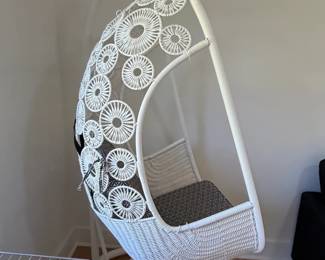 White Wicker Hanging Chair with Geometric Pattern Cushions and Stand second image