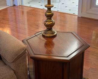 Octagonal side table with brass lamp