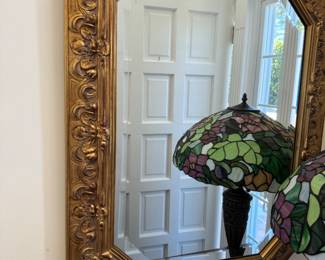 Gold framed beveled mirror