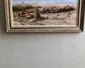 This 20"x 48" oil on canvas is a beautiful painting of a pride of lions