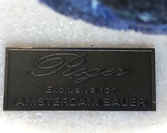 Sauer created sculpture combining gemstones with wildlife sculpture