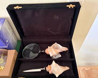 Conch shell letter opener and magnifying glass