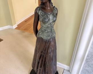 Bronze girl with diary statue