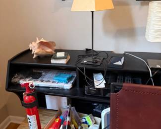 desk, lamps, extiguisher, leather chair