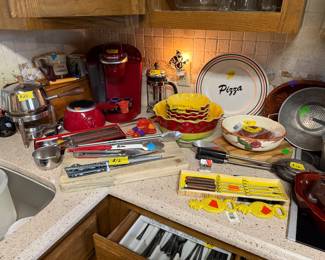 Kitchen utensil, Keurig, Fondue pots, Dishware and a set of silverware