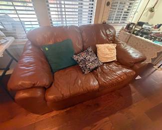 Brown leather loveseat in great condition
