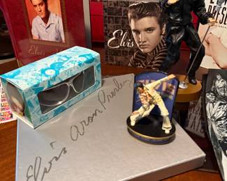 Elvis sunglasses, figurines, books and Christmas Elvis