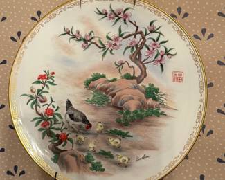 Asian collectable plates in box