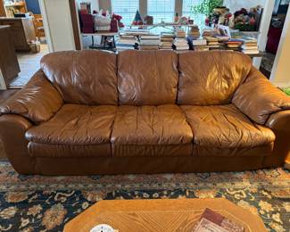 Leather golden brown couch.  Great condition.  No tears just normal wear