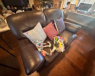 Great leather recliner couch....dark eggplant color