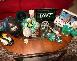 UNT license plate holder, koozies, eagles, and sun catchers