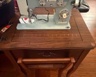 Universal sewing machine in great condition.  Comes with additional original feet
