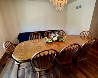 Dining table with 2 leaves and 8 chairs.