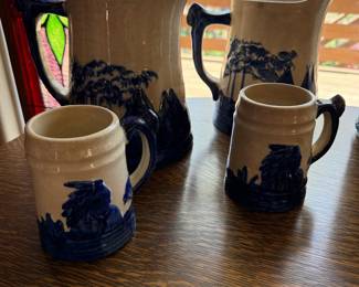 Set of 2 Blue and White "Old Sleepy Eye" Ceramic Pitchers and 2 Mugs