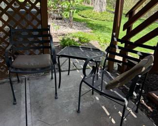 Wrought Iron Patio Set with Two Chairs and a Table