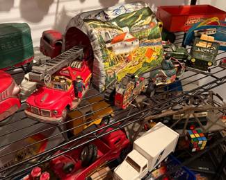 Collection of Vintage Tin Lithograph Toy Vehicles and Accessories