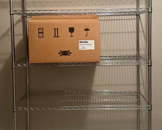 Metal Shelving Unit on Wheels - We have 2!