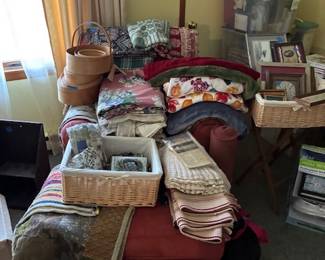 blankets, baskets, runners, framed needlepoint samplers
