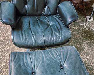 2 pcs. Eames style green lounge chair and ottoman 