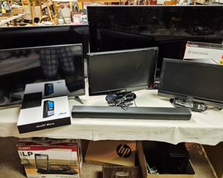 Much electronics. Flat screen T.V.'s, blue ray and DVD players and surroundsound system plus much more electronics 