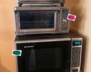 air fryers and very old microwave and stand