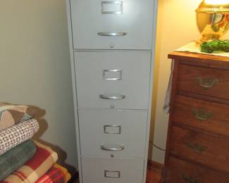 Several file cabinets, loads of office supplies